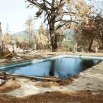 Richard Misrach: Untitled (OF 104-91: Swimming Pool), from 1991: The Oakland-Berkeley Fire Aftermath, 1991; archival pigment print; 59 1/2 x 75 in.; BAMPFA, gift of the artist.