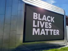 Black Lives Matter appears on the outdoor screen of BAMPFA