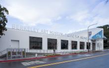 The Center Street view of the BAMPFA building, with a blue sky in the background.