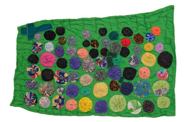photograph of Rosie Lee Tompkins 2005 quilt